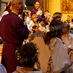 Bishop Marc with the children of the Christmas Pageant 