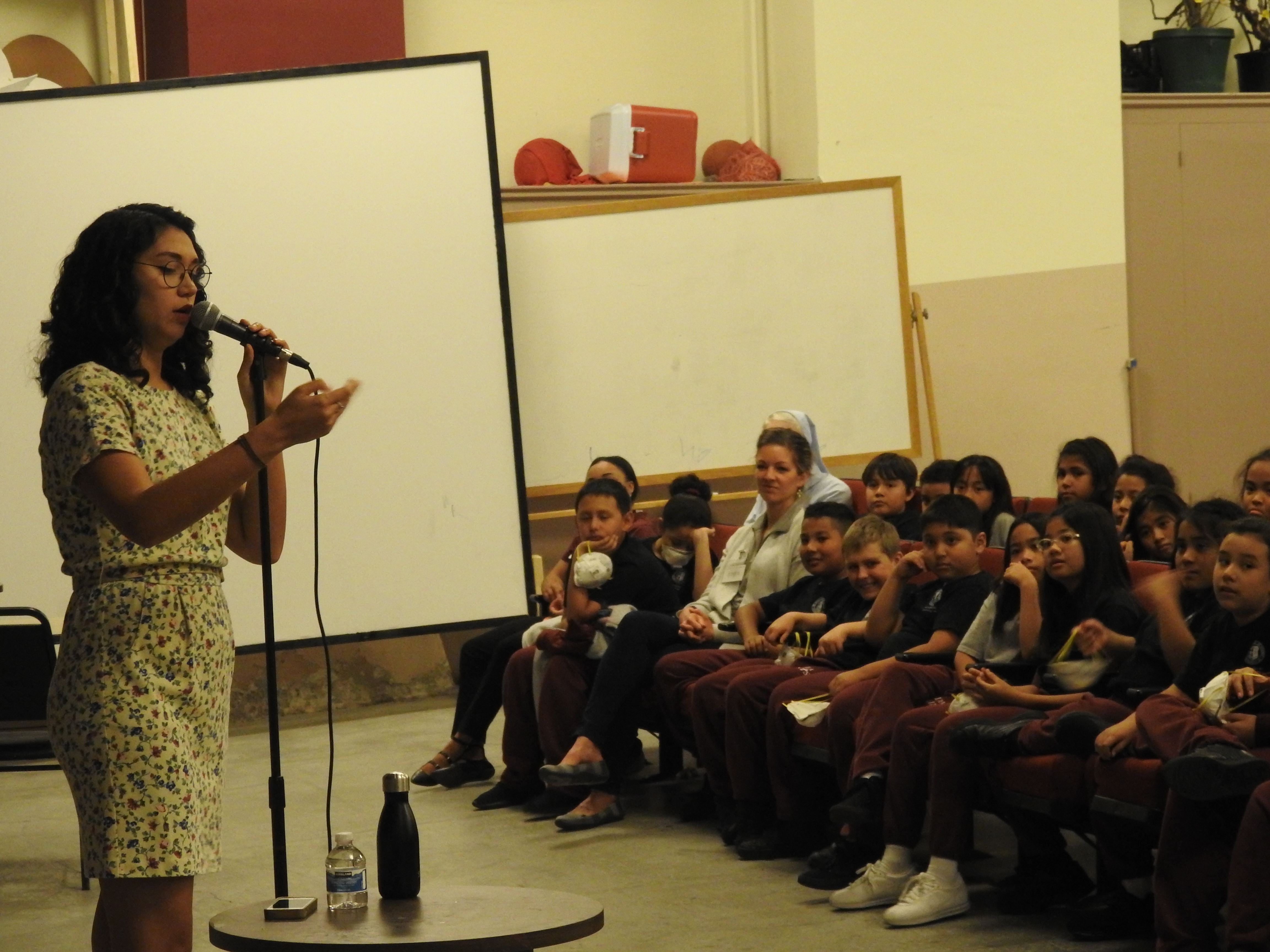 Sarah Kay gives a workshop for students from DeMarillac Academy