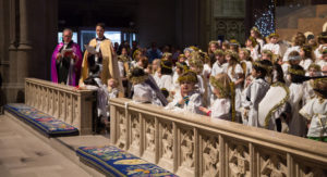 Bishop Marc and Dean Malcolm with the children during the Christmas pageant
