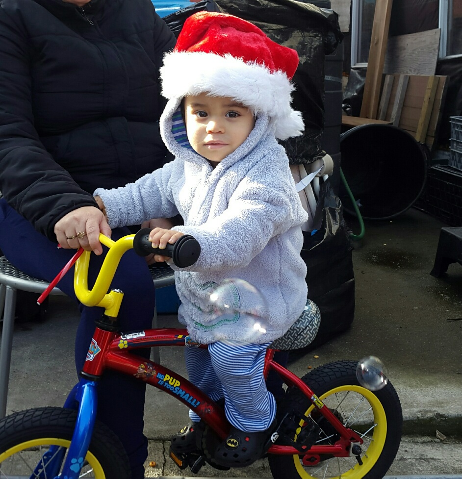 A young bike rider at the Bayview gathering in 2019, before the pandemic.