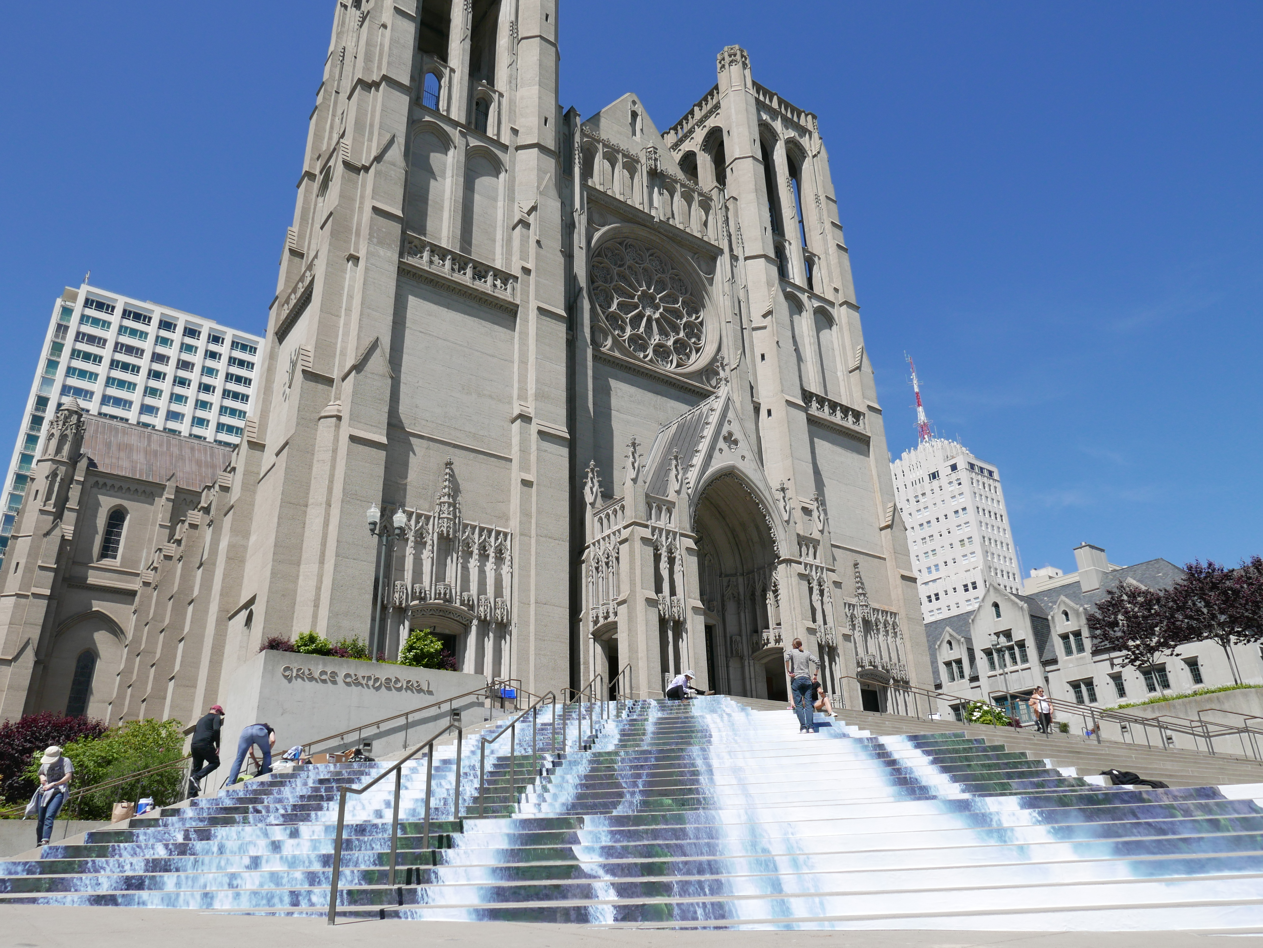 Flowing water imagery projected on the exterior steps of the Grace Cathedral