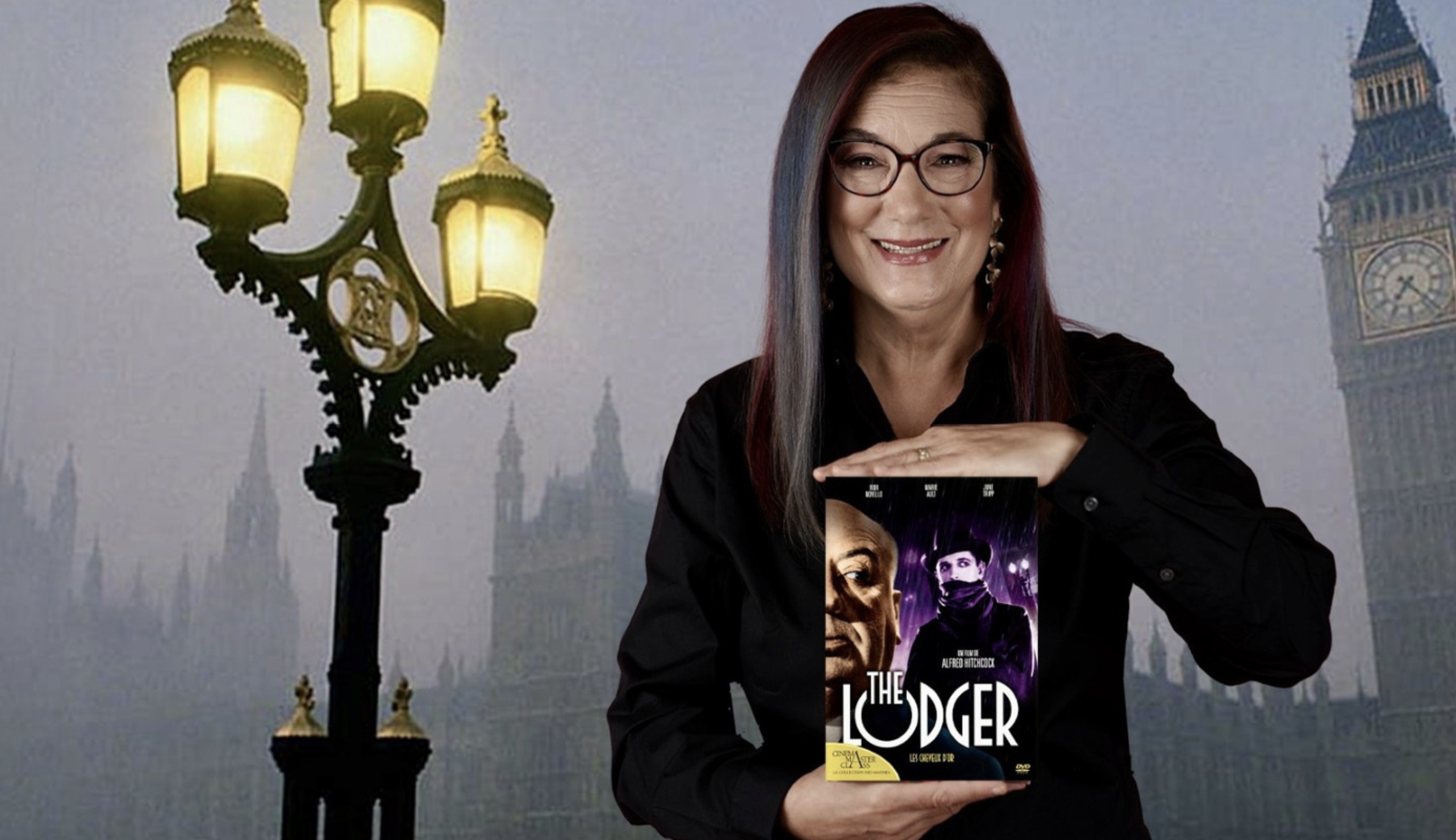 Organist Dorothy Papadakos holding a DVD of the movie "The Lodger" by Alfred Hitchcock.