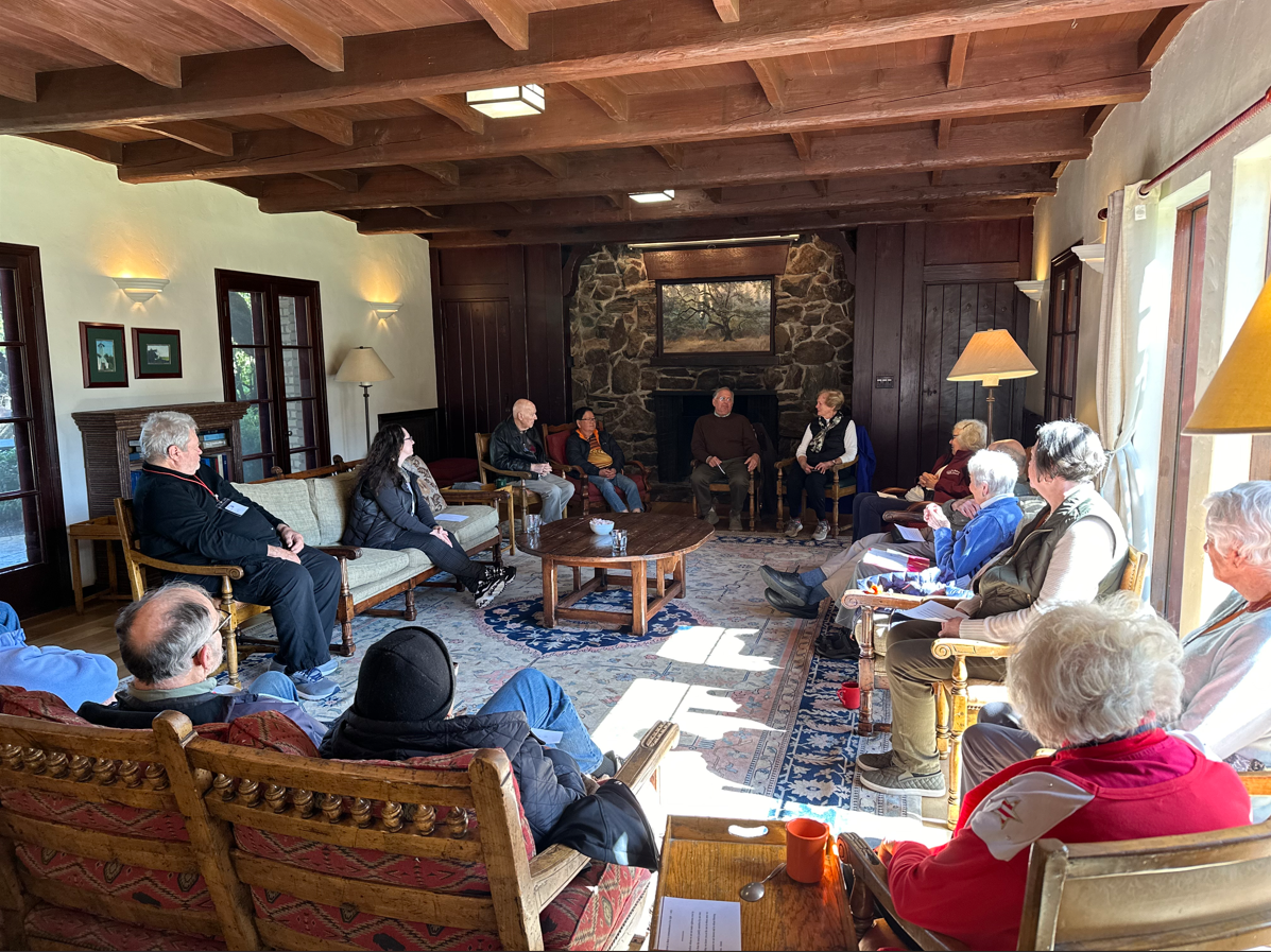 Church seniors gather around for a discussion, senior community event